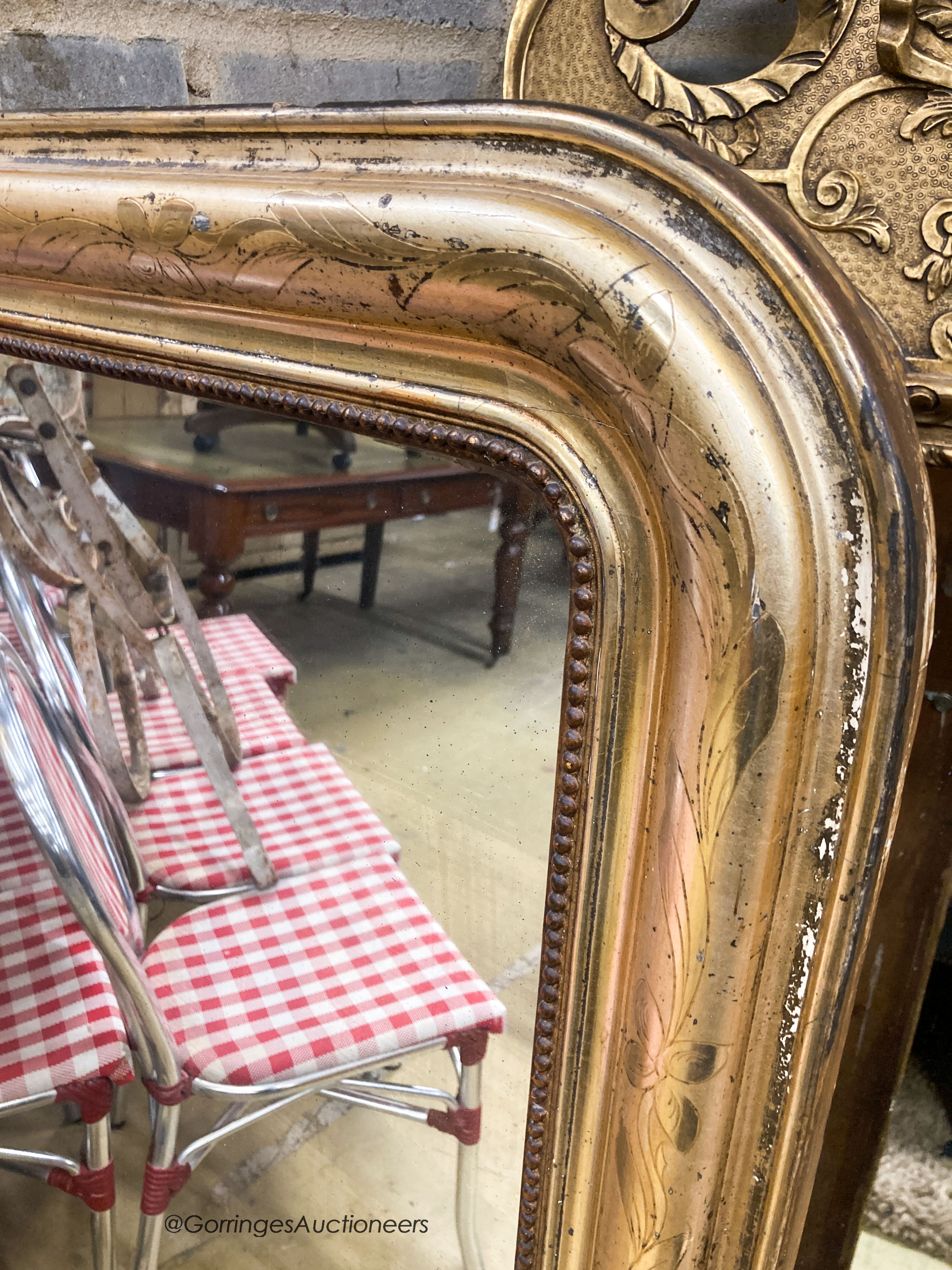 A 19th century French giltwood overmantel mirror, width 90cm, height 132cm